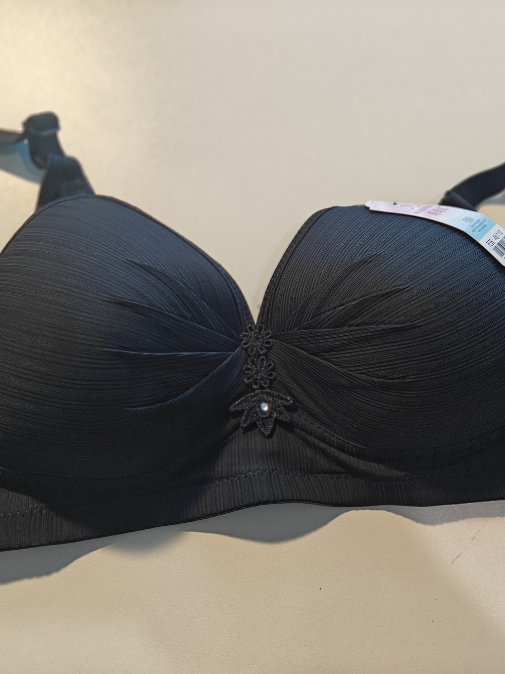 Smooth Black Padded Bra with Decorative Center Accent